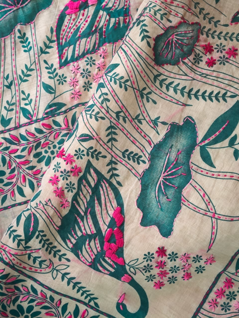 Green and pink kantha stitch on white Chanderi